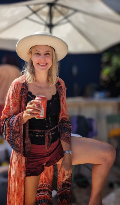 Maura poolside in the sun
